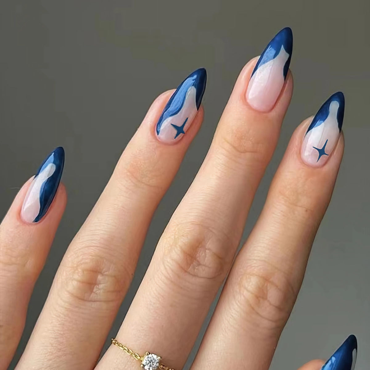 BABALAL Blue Nails Press on Medium Almond Fake Nails French Tip Glue on Nails Star Design Goth Acrylic Nails 24Pcs Full Cover Stiletto False Nails Manicure Stick on Nails
